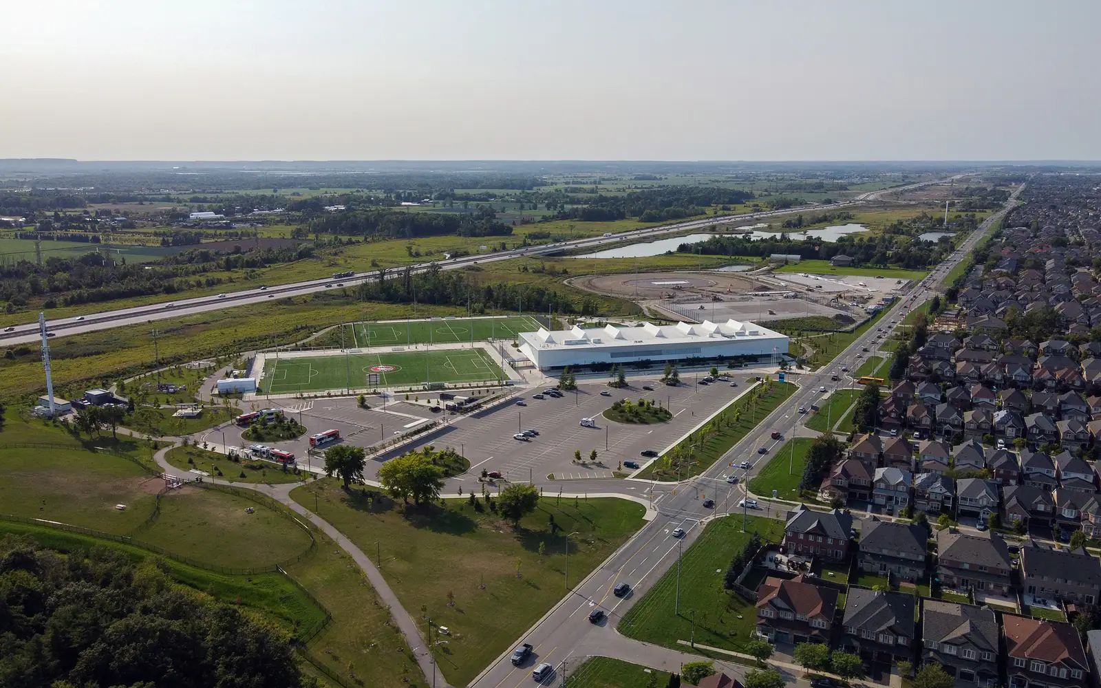 Aerial view of Churchill Meadows Community Centre and Mattamy Sports Park in Mississauga